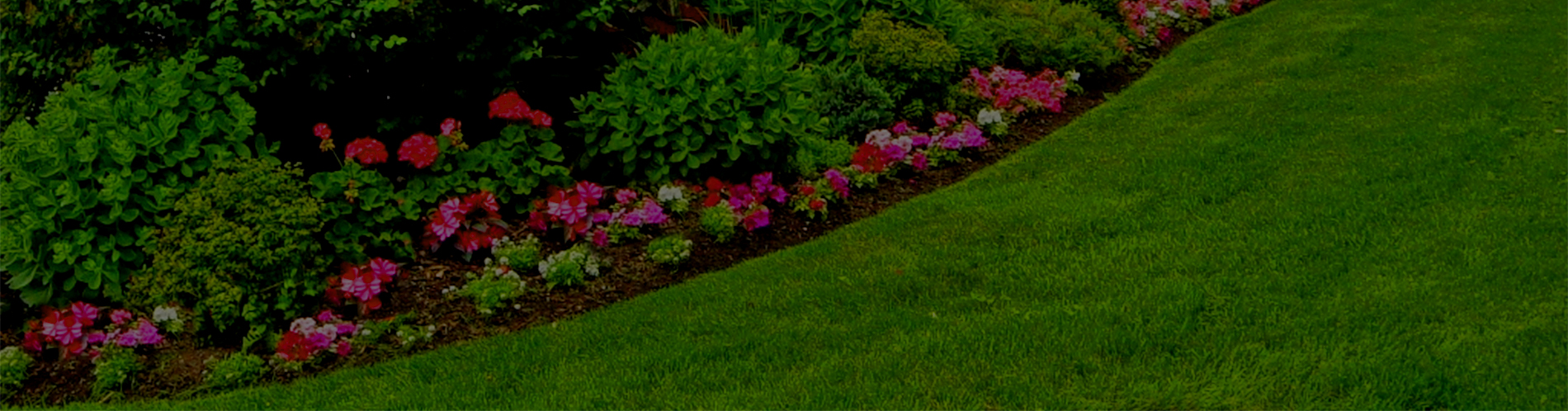 Soo Lawncare | Upper Peninsula Lawn Care |We are your Sault Ste. Marie landscaping & flower bed maintenance team. We provide an attractive, clean and healthy environment for which your landscaping flowers, bushes and shrubs can thrive in.